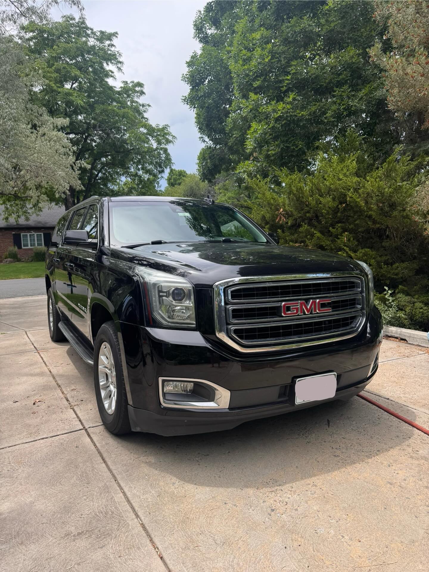 Black GMC Yukon, freshly detailed