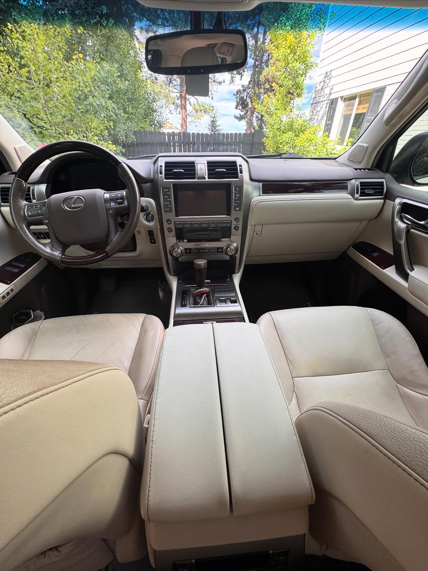 Tan leather interior, detailed front seats