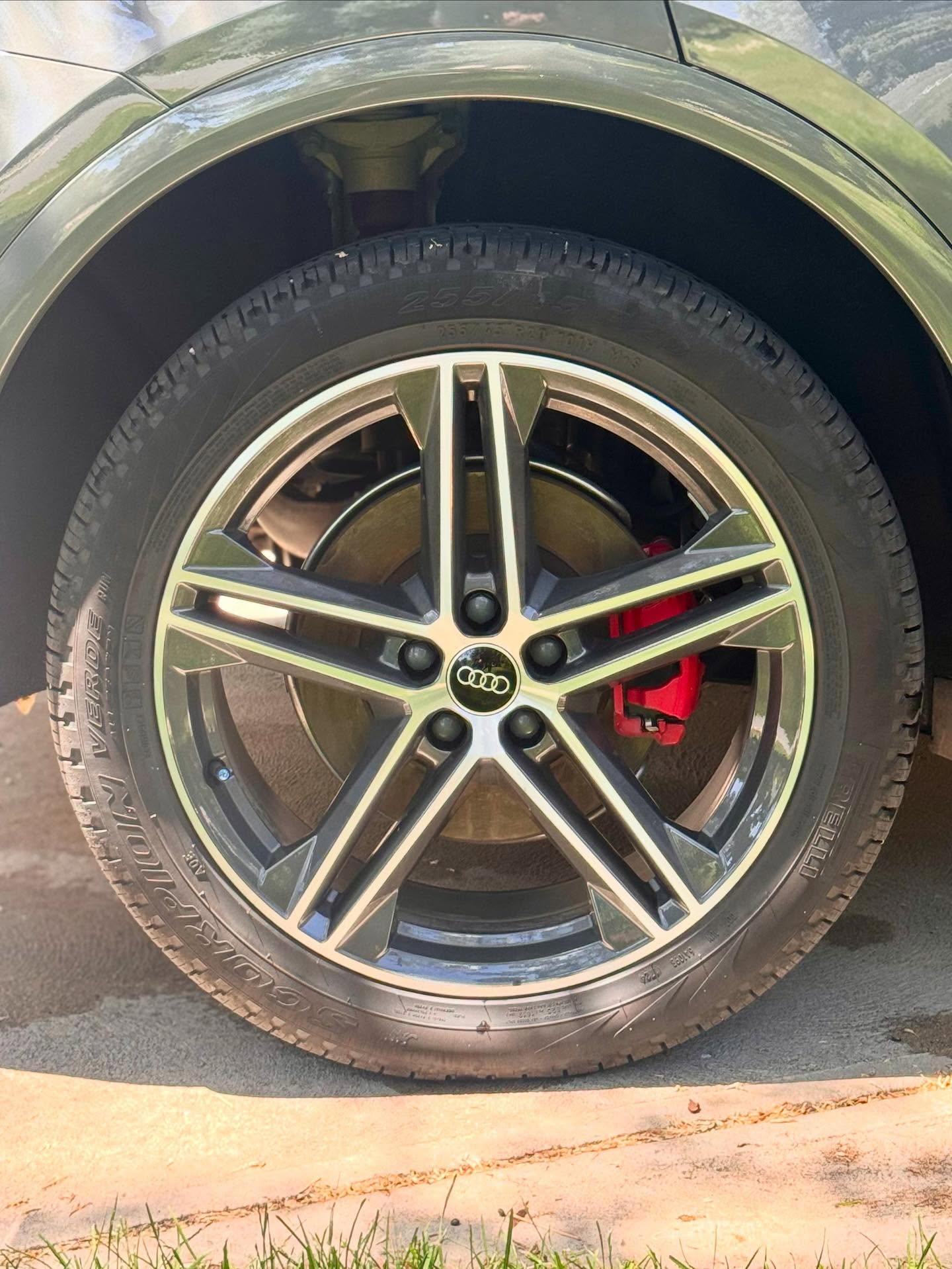 Audi alloy wheel with fresh tire shine
