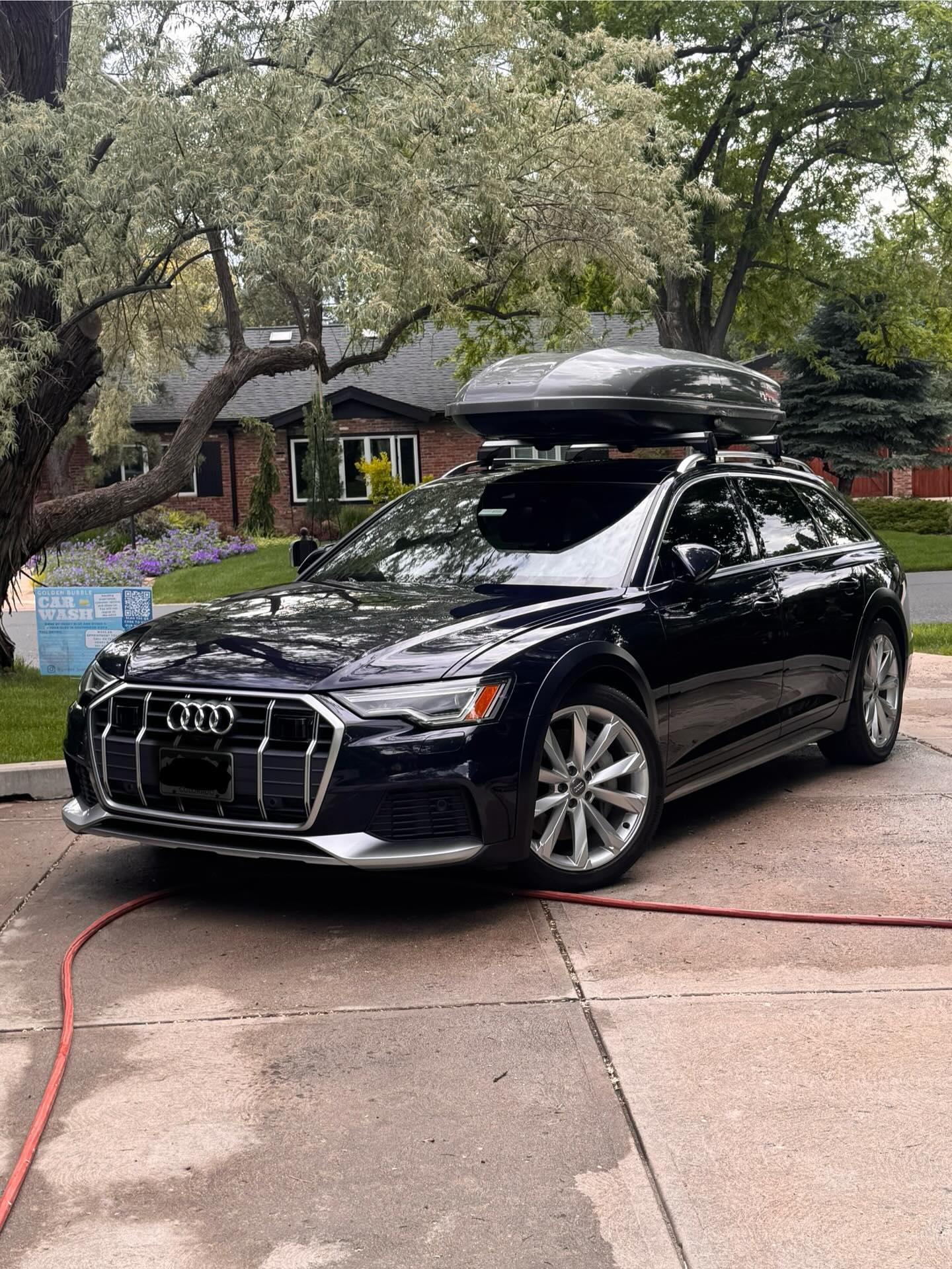 Black SUV with roof box